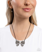 Load image into Gallery viewer, Paparazzi ♥ Bewitching Bow - Black ♥ N2911